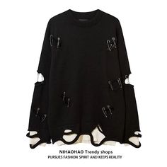 a black sweater with holes on the side