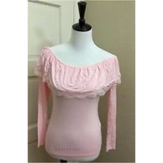 Cute As It Gets! Brand New And Never Worn- Just Don't Have Tags! Off The Shoulder Long Sleeve Top. Ruffle Across The Bust With A Dainty Lace Edge. Fitted Throughout The Body. Very Flattering! Baby Pink Feminine Ruffled Stretch Top, Feminine Stretch Tops With Ruffles, Feminine Stretch Top With Ruffles, Feminine Off-shoulder Cotton Top, Feminine Fitted Tops For Daywear, Fitted Off-shoulder Top With Lace Trim, Pink Ruffled Tops For Daywear, Stretch Lace Trim Tops For Daywear, Pink Lace Shirt