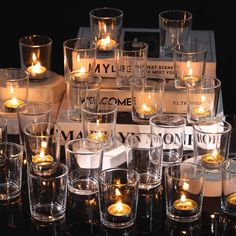 many different types of candles are on display