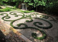 an ornamental garden design in the middle of a park