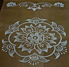 an intricately designed sidewalk with white chalk on it