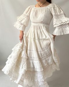 Absolutely stunning dress.  Condition: Great vintage condition.  Size: Would fit for XS (doesn't zip on Model S size, see photo 8), but can be easily remade to fit for S, M, due to the type of cloth and it's richness Contact me if you need any additional information. White Folk Dress, 70s Rich Fashion, 70s Wedding Dress Vintage, Catholic Dress, Dress 70s Style, Fancy White Dress, Maiden Dress, Bohemian Vintage Dress, Vintage White Dress