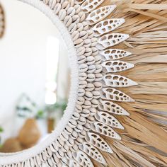 Mawi mirror - Joglo Living Mirror With Shells, Rafia Crafts, Placemat Wall Decor, Raffia Mirror, Beach Mirror, Beach 2024, Modern Coastal Interior Design, Coastal Chic Decor, Coastal Mirrors