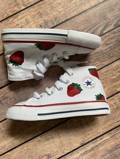 Strawberry Hand Painted High Top Converse For the strawberry lover in your life. This pair of painted converse has strawberries hand-painted across both shoes. This shoe is available in both toddler, youth, and adult sizes. White Converse Diy Design, Shoes Aesthetic Converse, Painting White Converse, Painted Shoes Converse, Painted Converse High Tops White, Converse Shoe Painting, Painting On Converse High Tops, Paint On Converse, Diy Painted Converse