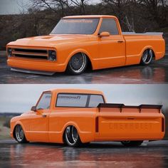 an orange pickup truck parked in a parking lot