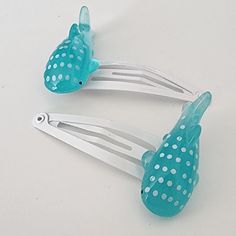 This is a set of large aqua blue whale shark hair clips. The hair clips are white.  They are 50mm long. You will receive two clips. I have another set available that has a smaller whale shark attached to the clip. Blue Whale Shark, White Hair Clip, Shark Hair, Whale Shark, Blue Whale, White Hair, Christmas List, Aqua Blue, Hair Clip