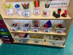 the shelves are filled with different types of stationery and crafting supplies for kids