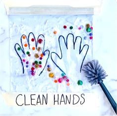 two handprints with the words clean hands written on them next to a brush