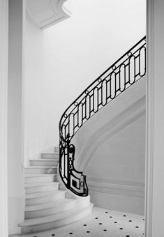 a black and white photo of a staircase