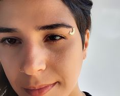 "Unique Indian Eyebrow Piercing Ring, a Boho-Hippie Eyebrow Ring made of 14k Solid Gold, Unisex Triball Piercing Jewelry, Statement Jewelry for Women and Men Ramp up your fashion statement factor and get yourself unique eyebrow-piercing jewelry! This unique eyebrow-piercing ring is sure to make a statement made of the finest 14k solid gold. Intended to highlight pretty features in your appearance or to add a cool edge to your style, this beautiful ring can also enhance other Piercing Locations: Unique Eyebrow Jewelry, Eyebrow Piercing Ring, Indian Piercing, Piercing Locations, Pretty Features, Eyebrow Piercing Jewelry, Eyebrow Jewelry, Schmuck Gold, Eyebrow Ring