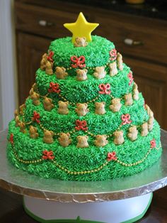 a christmas tree shaped cake on top of a table