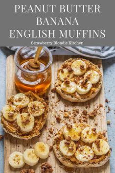 a wooden cutting board topped with banana english muffins next to a jar of honey