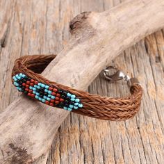 Horsehair Wrap Bracelets Brown Beaded Braided Bracelet For Festivals, Adjustable Red Southwestern Bracelets, Southwestern Style Adjustable Red Bracelets, Brown Beaded Bohemian Braided Bracelet, Brown Bohemian Beaded Braided Bracelets, Brown Bohemian Braided Beaded Bracelet, Bohemian Beaded Bracelets With Lobster Clasp For Festivals, Red Beaded Bracelets With Black Beads For Festival, Adjustable Brown Beaded Bracelets With Black Beads