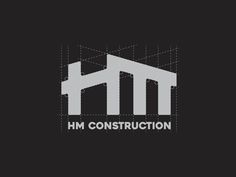 the h m construction logo is shown on a black background with white lines and gray letters