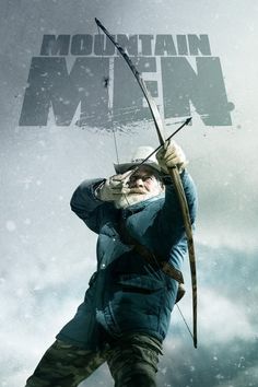 an old man with a bow and arrow in his hands is standing on the snow