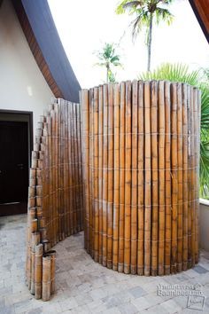 a room that has some kind of structure made out of bamboo