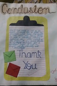 a handwritten thank you note is attached to a bulletin board