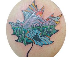 a tattoo on the back of a person's head with mountains and trees in the background