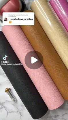 a bunch of different colored leathers sitting next to each other