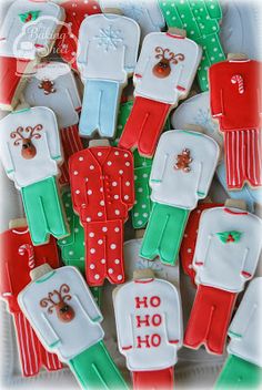 decorated cookies in the shape of clothes and reindeers