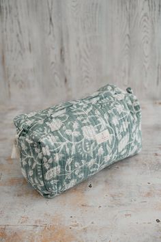 Lovely Cotton Toiletry Bag Whether you're heading off on an outdoor adventure or just want to be extra sure that no leakage occurs during your travels, you can't go wrong with our toiletry bag.  Our bag has a rectangular and wide shape and is built of one large compartment with small pockets for small items and everything is closed in one zipper.  Its outer part is made of 100% cotton, printed in white floral motifs on sage green background , and its inner side is made of the 100% durable nylon Travel Makeup Bag, Travel Bag Organization, Accessories Bag, Organizer Bag, Toiletry Storage, Makeup Bags Travel, Travel Makeup, Toiletry Bags, Bag Organization