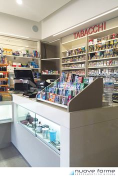 the inside of a pharmacy store with shelves full of medicine and medical supplies on display