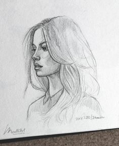 a pencil drawing of a woman's face