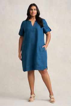 Perfect for transeasonal weather, this 100% French Linen Shift Dress features the relaxed fit you love with trendy side pockets and a curved hem. Available in Navy Delave, which features a beautiful, mottled effect, alive with highs and lows of colour, this dress is complete with a notch neck and top stitch detailing. A flattering and comfortable style that can be paired back with a white sneaker for a classic casual look. Linen Shift Dress, Latest Colour, Comfortable Style, Classic Casual, French Linen, Comfortable Fashion, White Sneaker, Shift Dress, High & Low