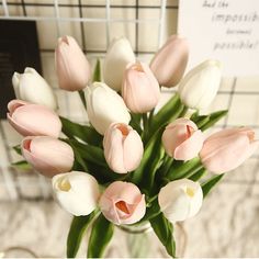 PRICES MAY VARY. 10pcs white tulips artificial flowers and 10pcs pink flowers. The fake flowers will be covered with dust. You can gently wipe the flowers with a wet towel to restore their original beauty. Slight deformation at flowers or leaves due to normal extrusion in daily use can be recovered easily by simple manual adjustment. 【Nice Size】Our faux flowers look and feel almost real. Total tulip flower height 13.4 inches / 34cm; flower diameter: 1.97” x 1.2”/5 x 3cm. The stems not that much, Tulpen Arrangements, Fake Wedding Flowers, Tulips Arrangement, Artificial Tulips, Artificial Bouquet, Tulip Bouquet, Yellow Tulips, Spring Beauty, White Tulips