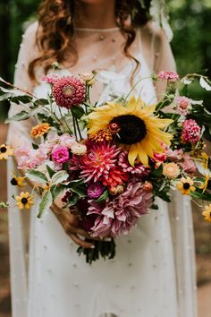 Sunflower Wedding Flowers: Bold Pink and Yellow Bridal Bouquet Sunflower Bouquet Wedding, Eucalyptus Wedding Decor, Sunflower Bridal Bouquet, Outfit Recipes, Sunflower Arrangements, Sunflower Wedding Bouquet, Wedding Color Combos, Nails Outfit, Sunflower Bouquet