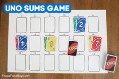 the uno sums game is displayed on a table