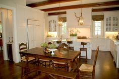 the kitchen is clean and ready to be used as a dining room or family room