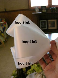 the instructions for how to fold an origami paper bow in 3 easy steps