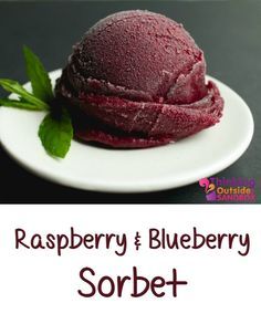 raspberry and blueberry sorbet on a white plate