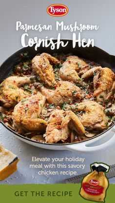 a pan filled with chicken on top of a table