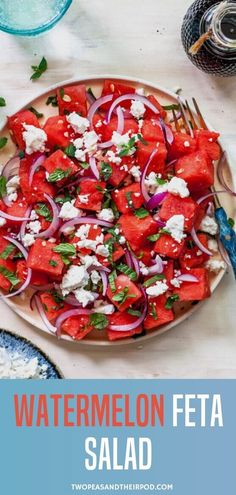 watermelon feta salad on a plate with red onions