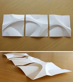 three pieces of paper cut out to look like wavy shapes on a table top and below