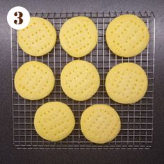 six cookies on a cooling rack with the number three in front of them and four to the side