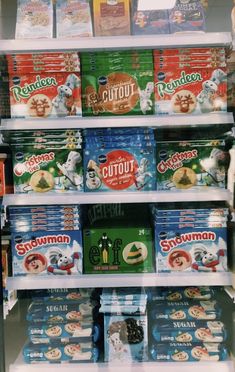 shelves in a store filled with cereal and other snacks, including cat food or dog treats