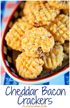 cheddar bacon crackers in a bowl on a blue and white tablecloth