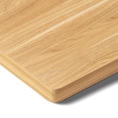 a close up of a wooden surface on a white background