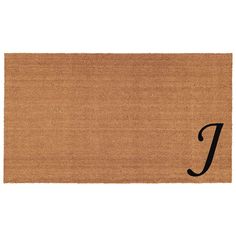 a door mat with the letter j in black ink on it and a white background