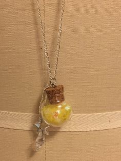 "Silver necklace with yellow star glitter in a glass circular bottle and crystal star charms Chain 36\" in length Glass bottle 1.25\" in length" Astoria Ny, Yellow Star, Bottle Necklace, Crystal Stars, Star Charms, Glass Bottle, Glass Bottles, Charm Necklace, Necklace Etsy