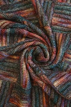 a multicolored knitted fabric is shown