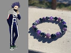 an anime character wearing a bracelet with purple beads on it and a photo of him in the background