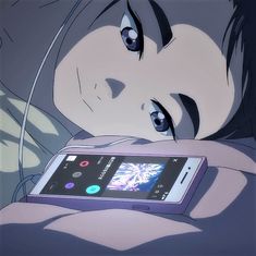 an anime character holding a cell phone in her hand and looking at the screen while laying down