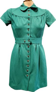 60's/70's Green Mod Mini Dress Green Retro Vintage Dress, Vintage Fitted Green Dress, 1950s Style Green A-line Dress, Green Fitted Vintage Dress, Retro Fitted Green Mini Dress, Green Vintage Formal Dress, Green Lined Vintage Dress, Retro Green A-line Mini Dress, Retro Green Lined Vintage Dress