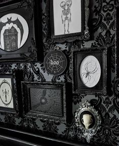 there are many pictures on the wall with black and white designs in them, but no one has seen it