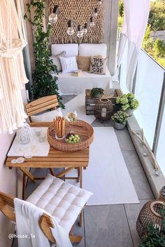 an outdoor patio with wooden furniture and plants on the side wall, covered in wicker