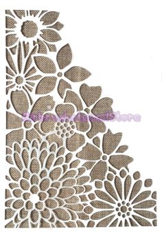 a paper cutout with flowers on it